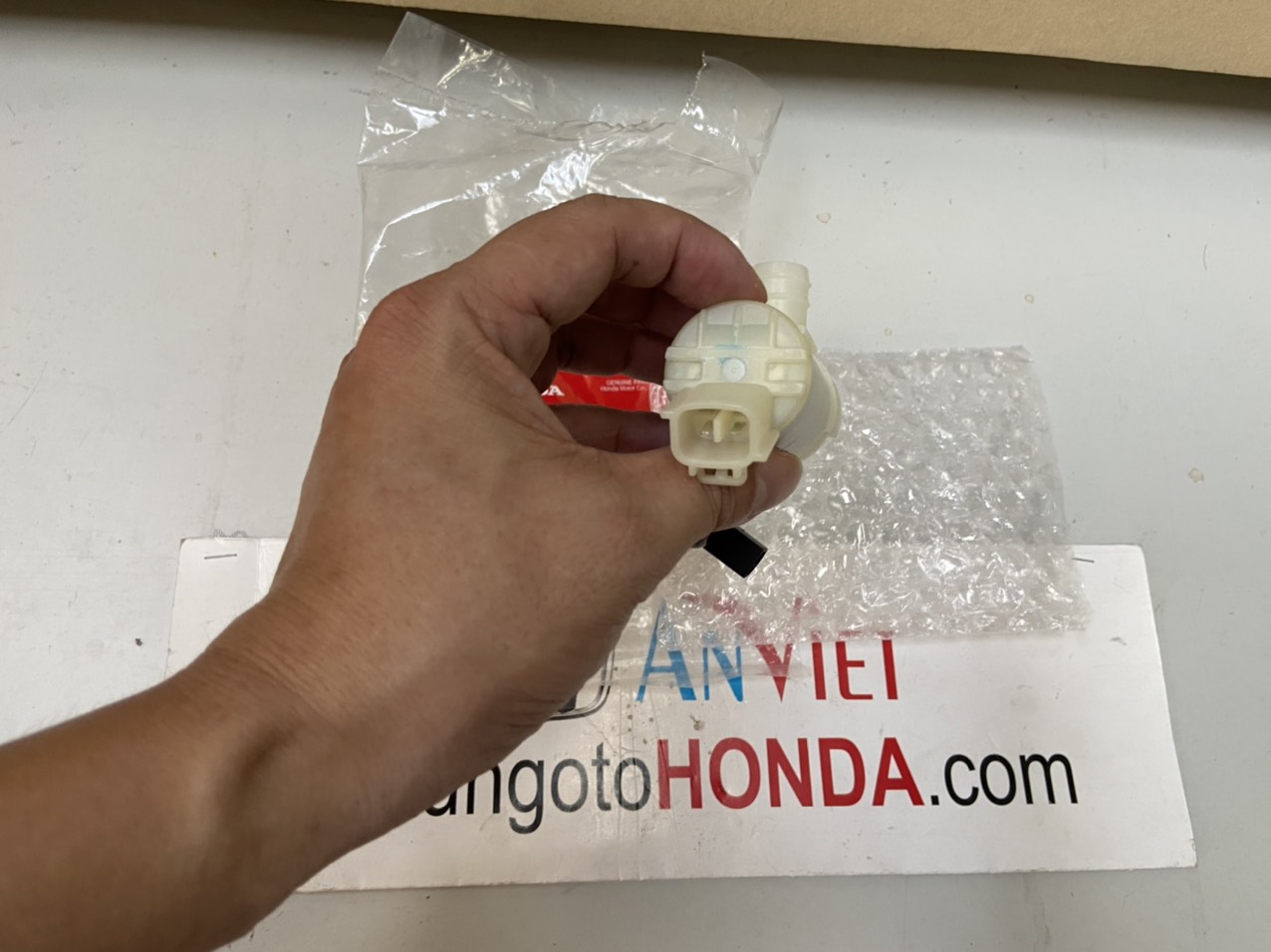 Mô tơ bơm nước rửa kính xe Honda CITY 2013 